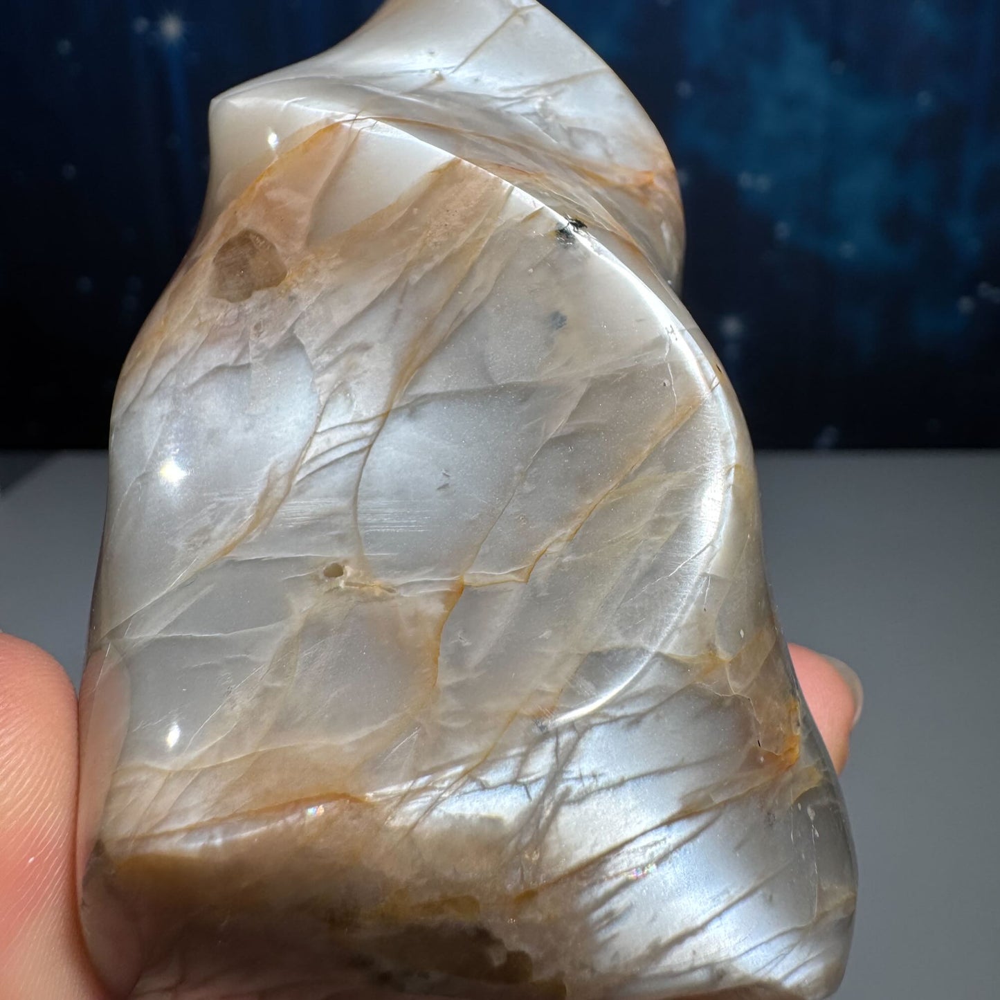 Flashy Black and Peach Moonstone flame with Sunstone
