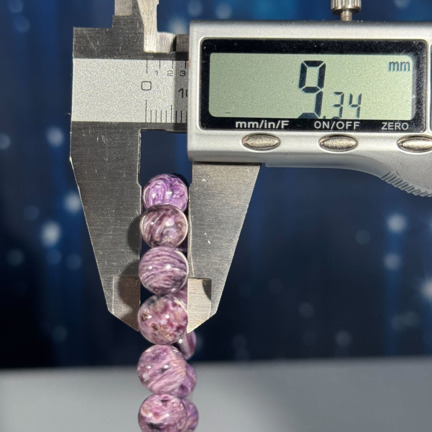 One (1) Charoite bracelet - 9mm beads, fits 6.5" wrist - flashy