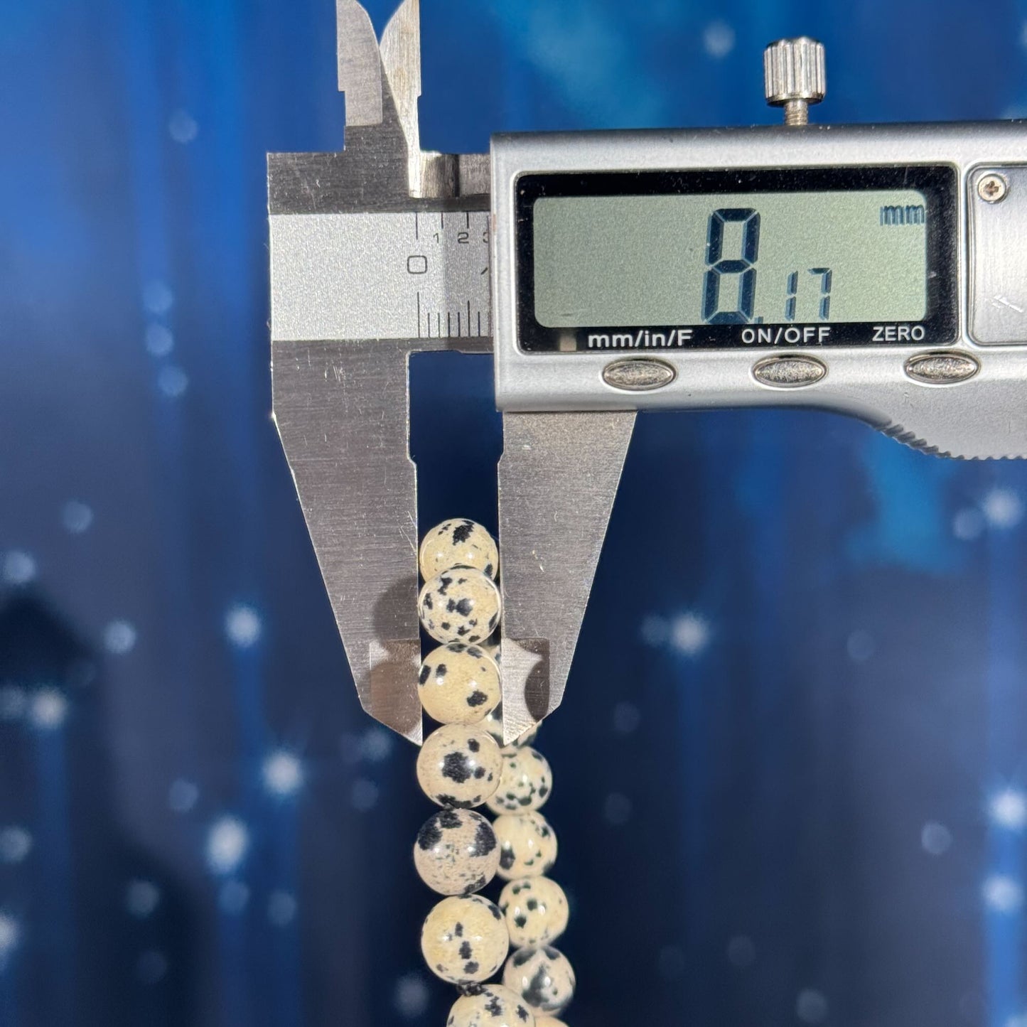 One (1) Dalmatian Stone bracelet - 8mm beads - fits 6.25" wrist