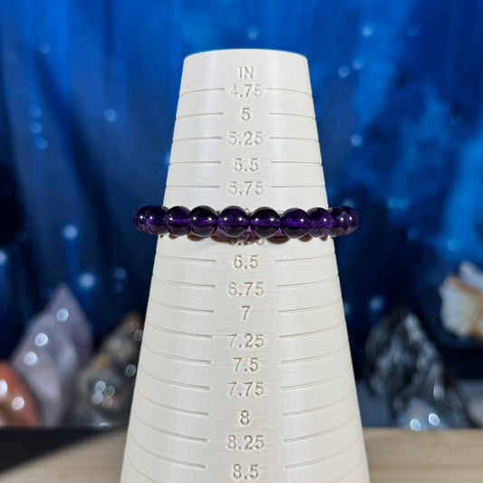 One (1) Amethyst bracelet – 8mm beads - fits 6.25" wrist