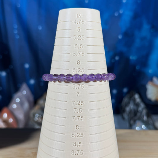 One (1) Amethyst bracelet – 6mm beads - fits 6.5" wrist