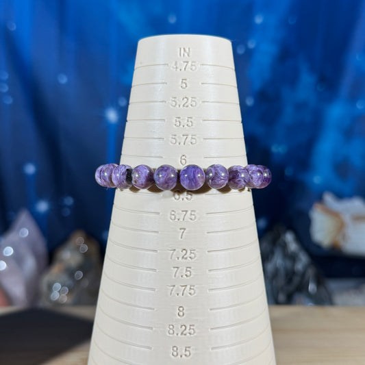 One (1) charoite bracelet - 8mm beads, fits 6.25" wrist - flashy