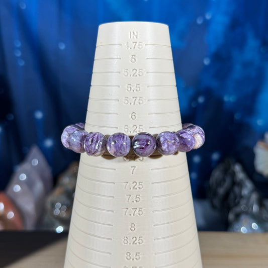 One (1) Charoite bracelet - 11mm beads, fits 6.5" wrist - flashy