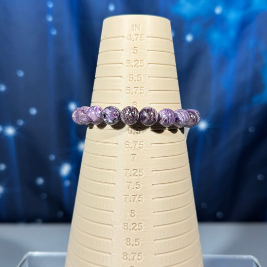 One (1) charoite bracelet - 9mm beads, fits 6.25" wrist - flashy