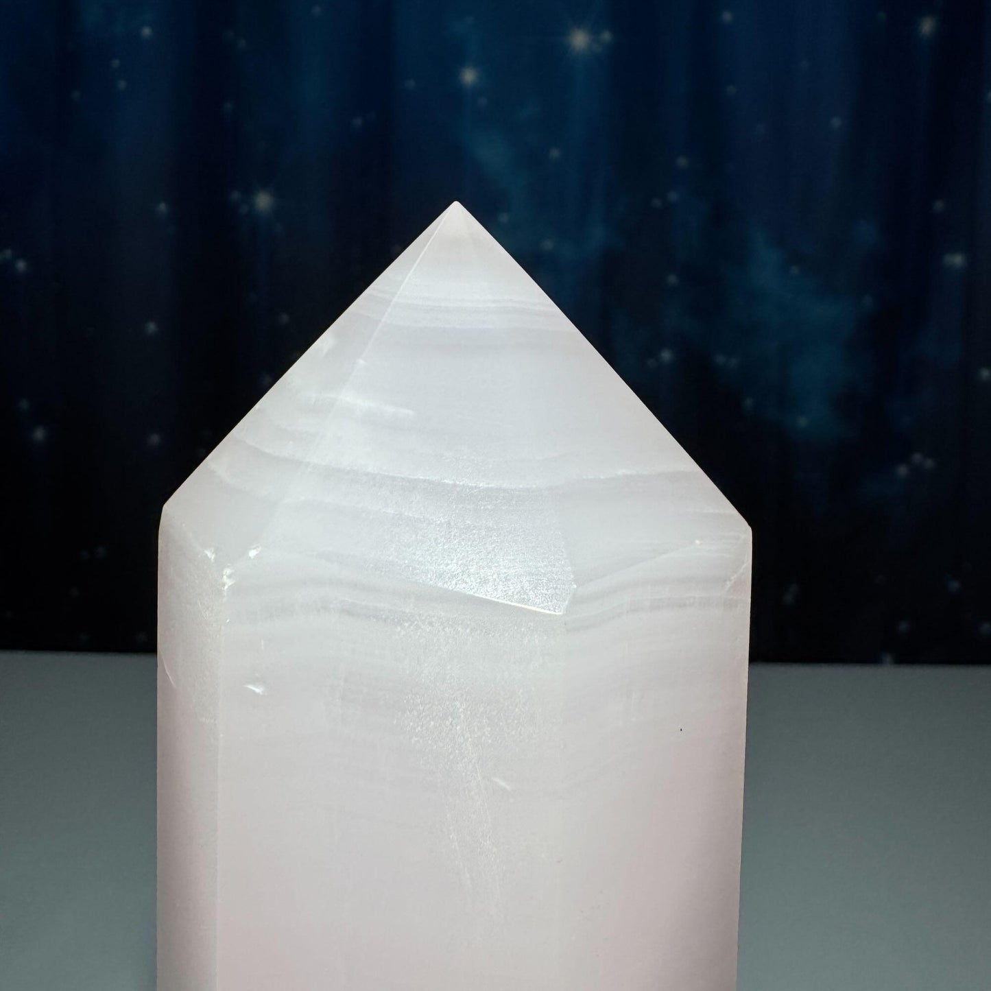 XL pink Mangano Calcite tower | 9 5/8ā tall | 1.443 kilograms | Damage Discount | UV reactive | pink Banded Calcite tower