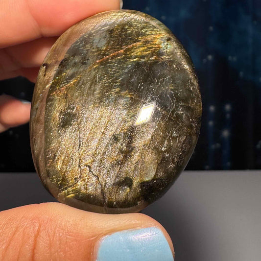 Flashy Labradorite palm stone | 2 1/8” long | 70 grams | silver flash | orange flash | blue flash | yellow flash | pink flash | purple flash