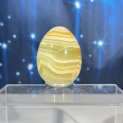 Green banded calcite egg - 2" × 2" × 2 5/8" - 8.8 oz