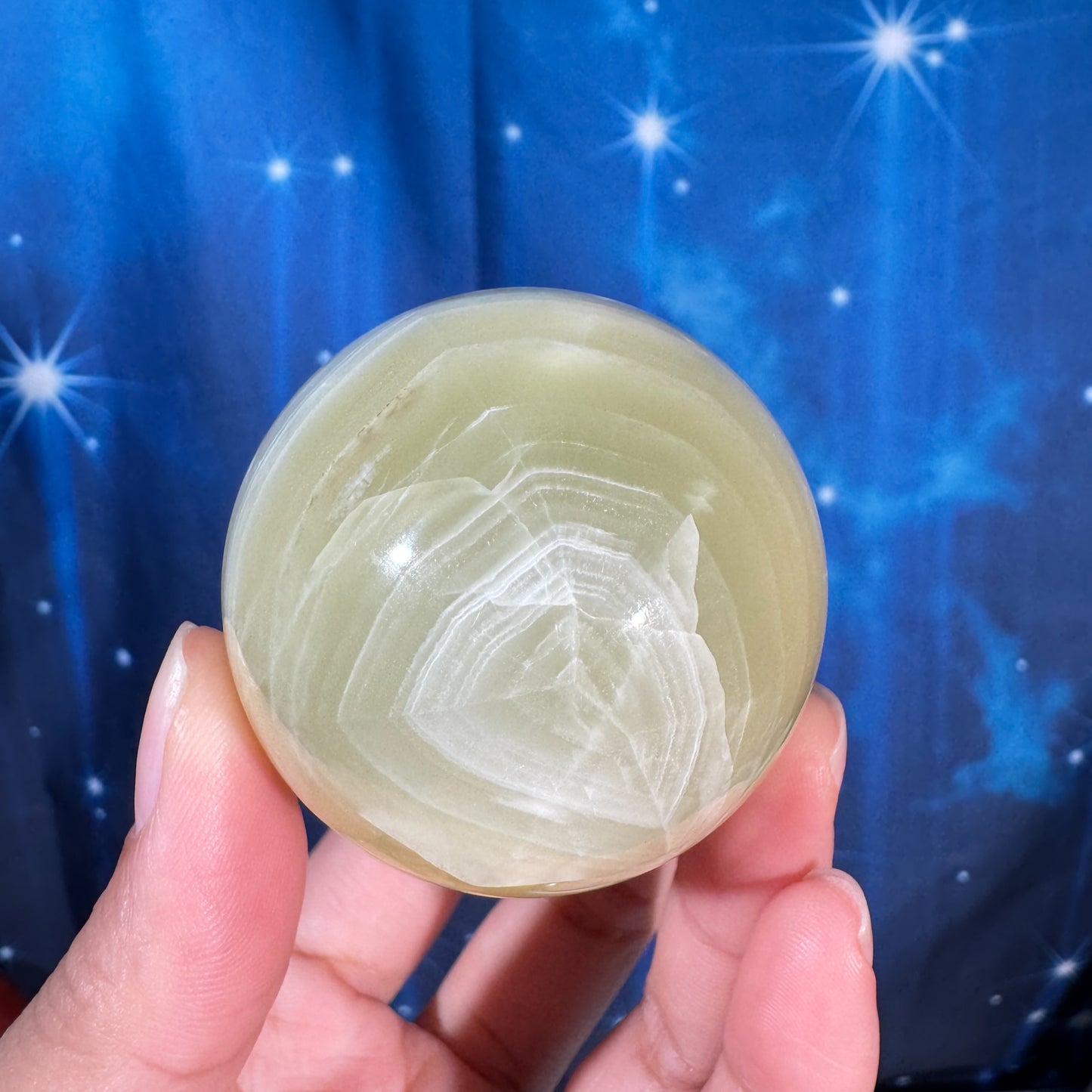 Green banded calcite egg - 2" × 2" × 2 5/8" - 8.8 oz