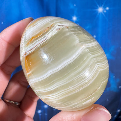 Green banded calcite egg - 2" × 2" × 2 5/8" - 8.8 oz