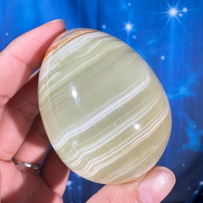 Green banded calcite egg - 2" × 2" × 2 5/8" - 8.8 oz