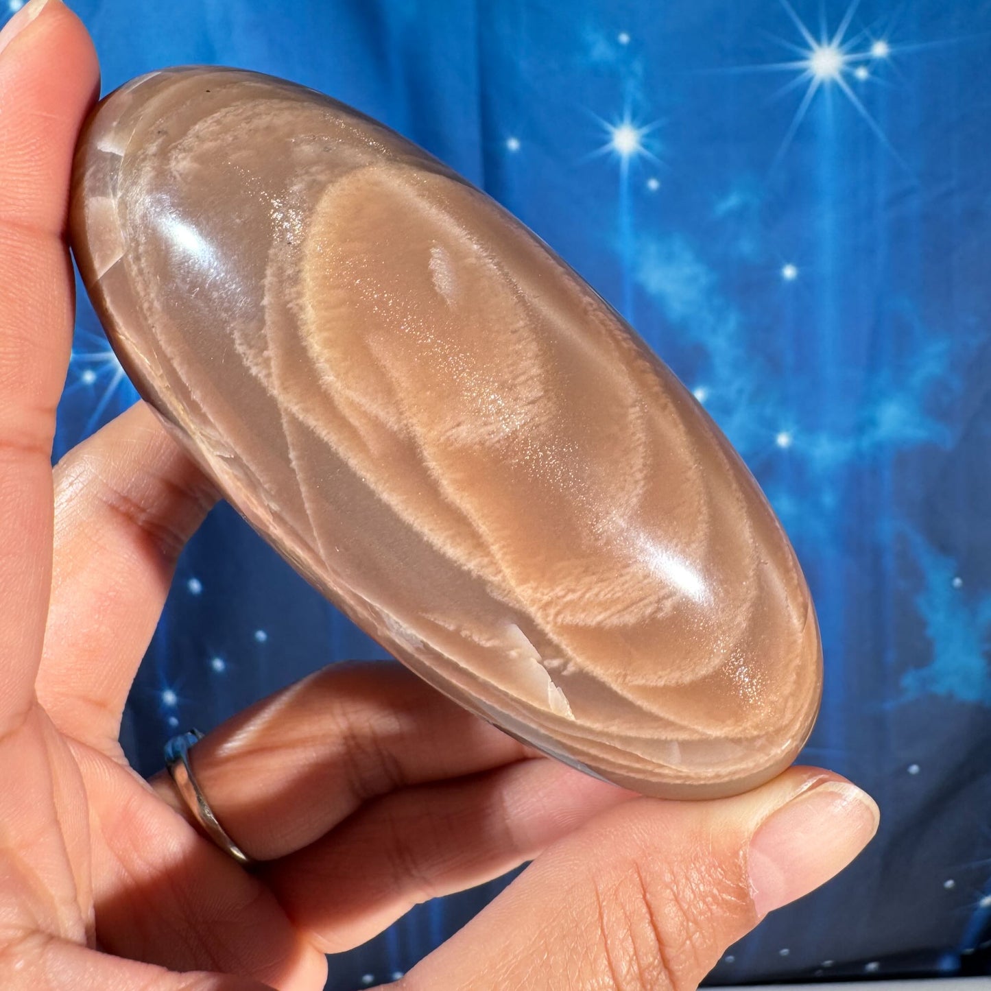 Peach moonstone with sunstone lingam - 4" × 1 3/4" × 1 3/4" - 9.9 oz