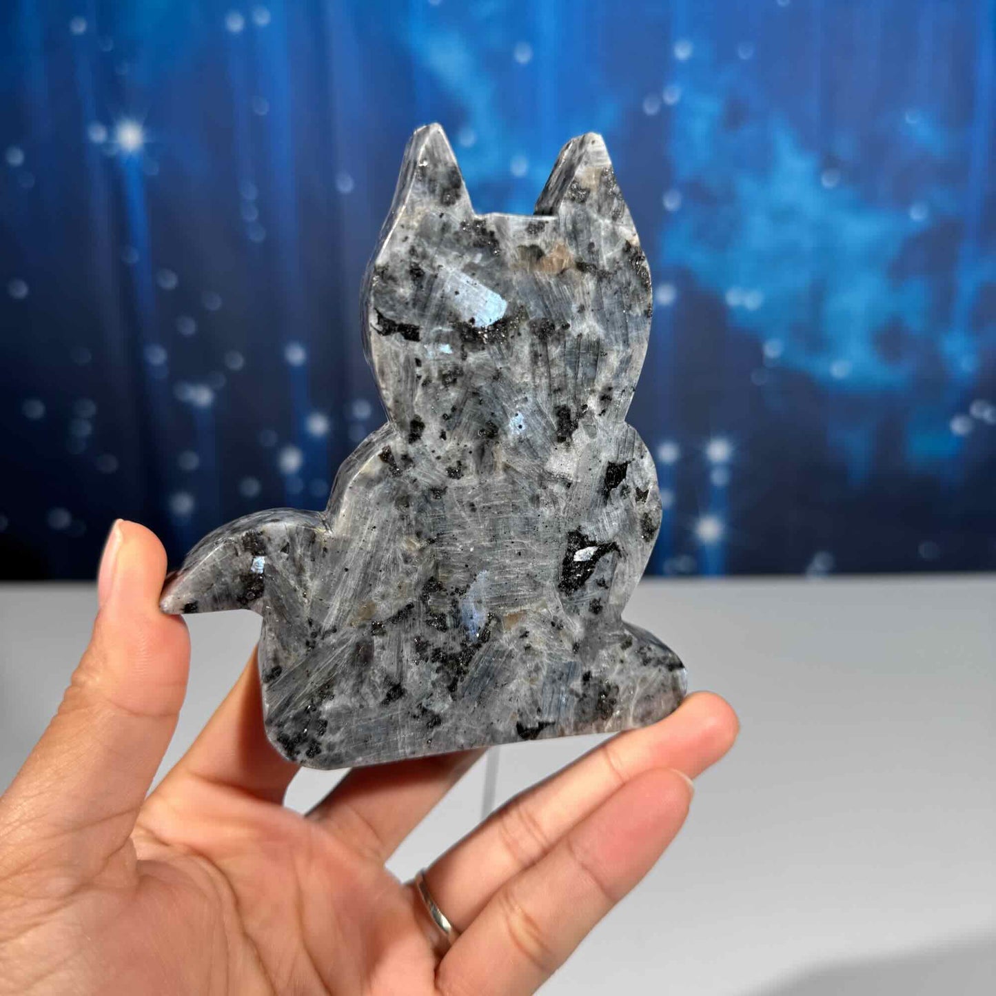 Larvikite cat carving
