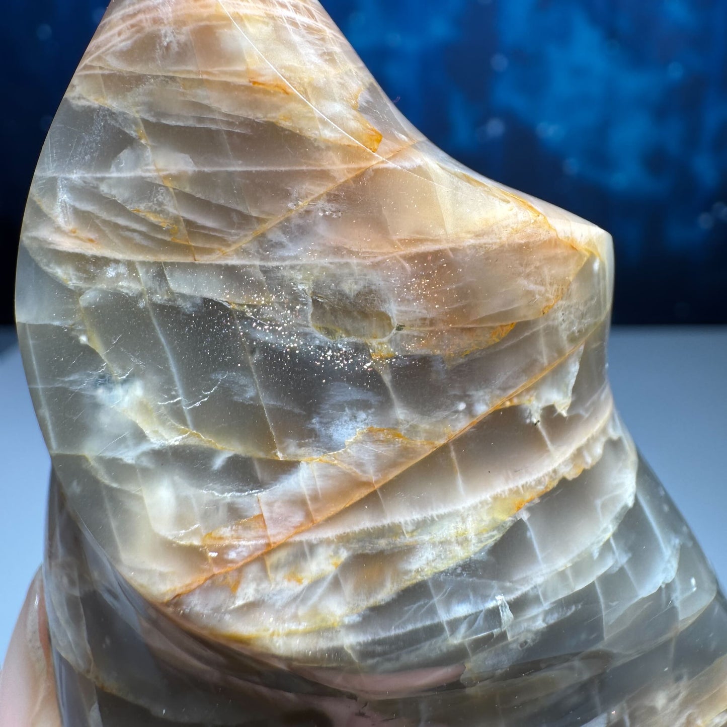 Flashy Black and Peach Moonstone flame with Sunstone