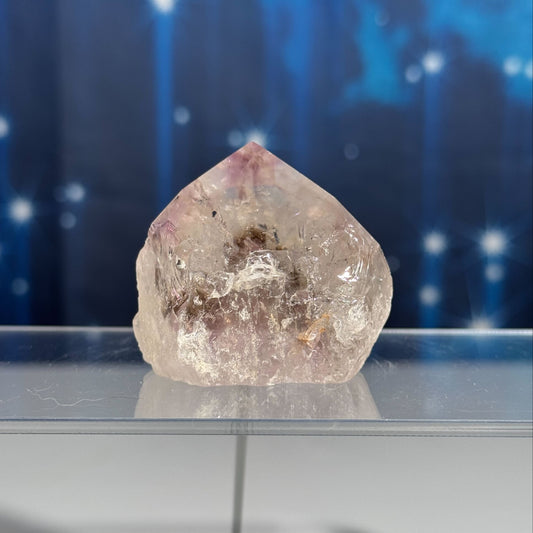 Amethyst top polished point with phantoms