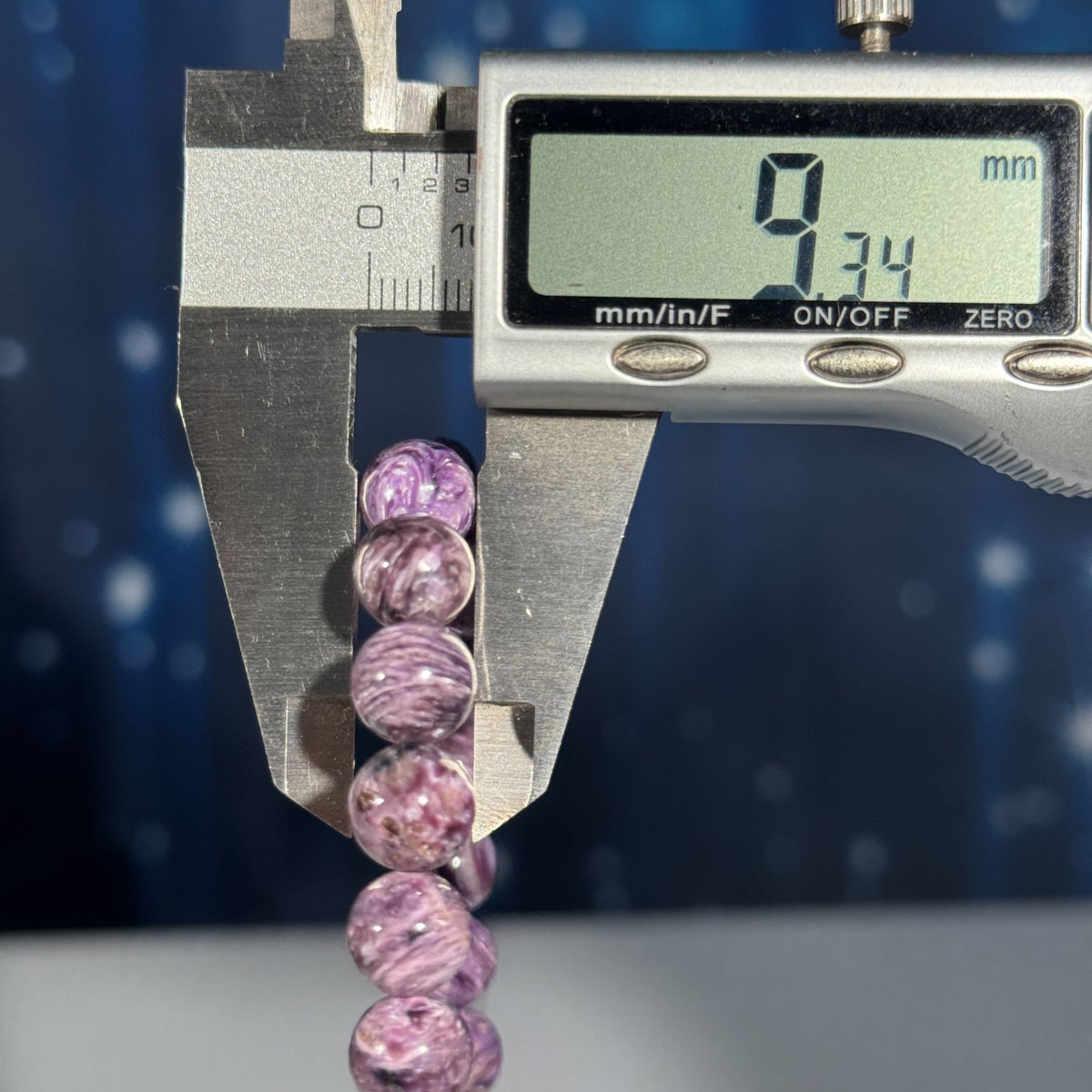 One (1) Charoite bracelet - 9mm beads, fits 6.5" wrist - flashy