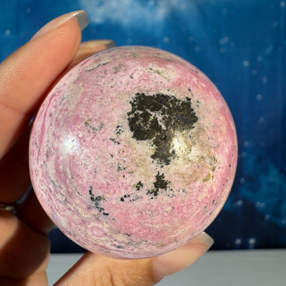 Rhodonite Sphere with Pyrite – 0.281 kg