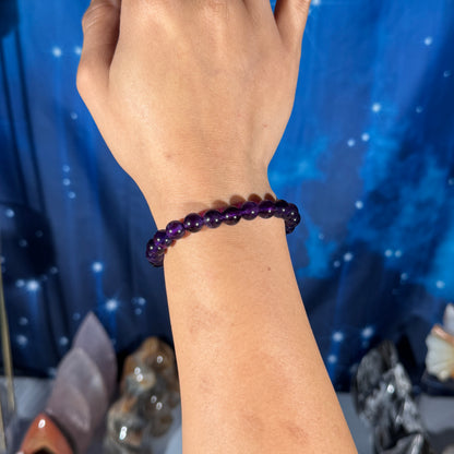 One (1) Amethyst bracelet –  8mm beads - fits 6.25" wrist