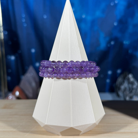 One (1) Amethyst bracelet – 6mm beads - fits 6.5" wrist