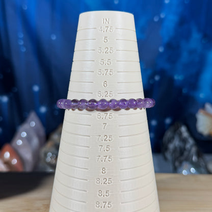 One (1) Amethyst bracelet – 6mm beads - fits 6.5" wrist