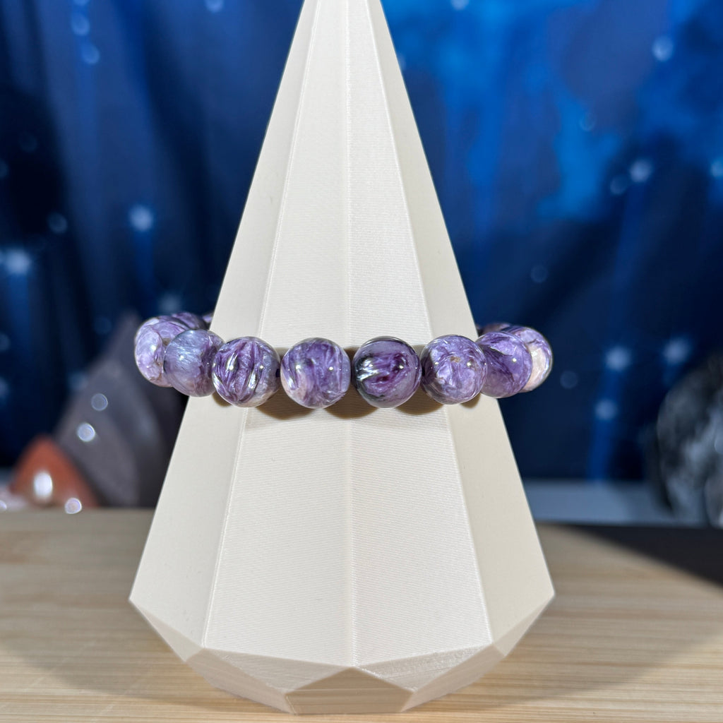 One (1) Charoite bracelet - 11mm beads, fits  6.5" wrist - flashy