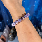 One (1) Charoite bracelet - 11mm beads, fits  6.5" wrist - flashy