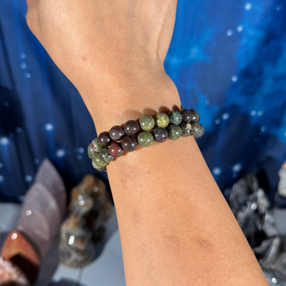 One (1) Dragonsblood bracelet - 8mm beads - fits 6.25" wrist