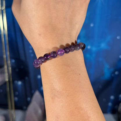 One (1) Purple fluorite bracelet - 8mm beads - fits 6" wrist