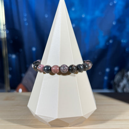One (1) Rhodonite bracelet - 8mm beads - fits 6.25" wrist - low-grade
