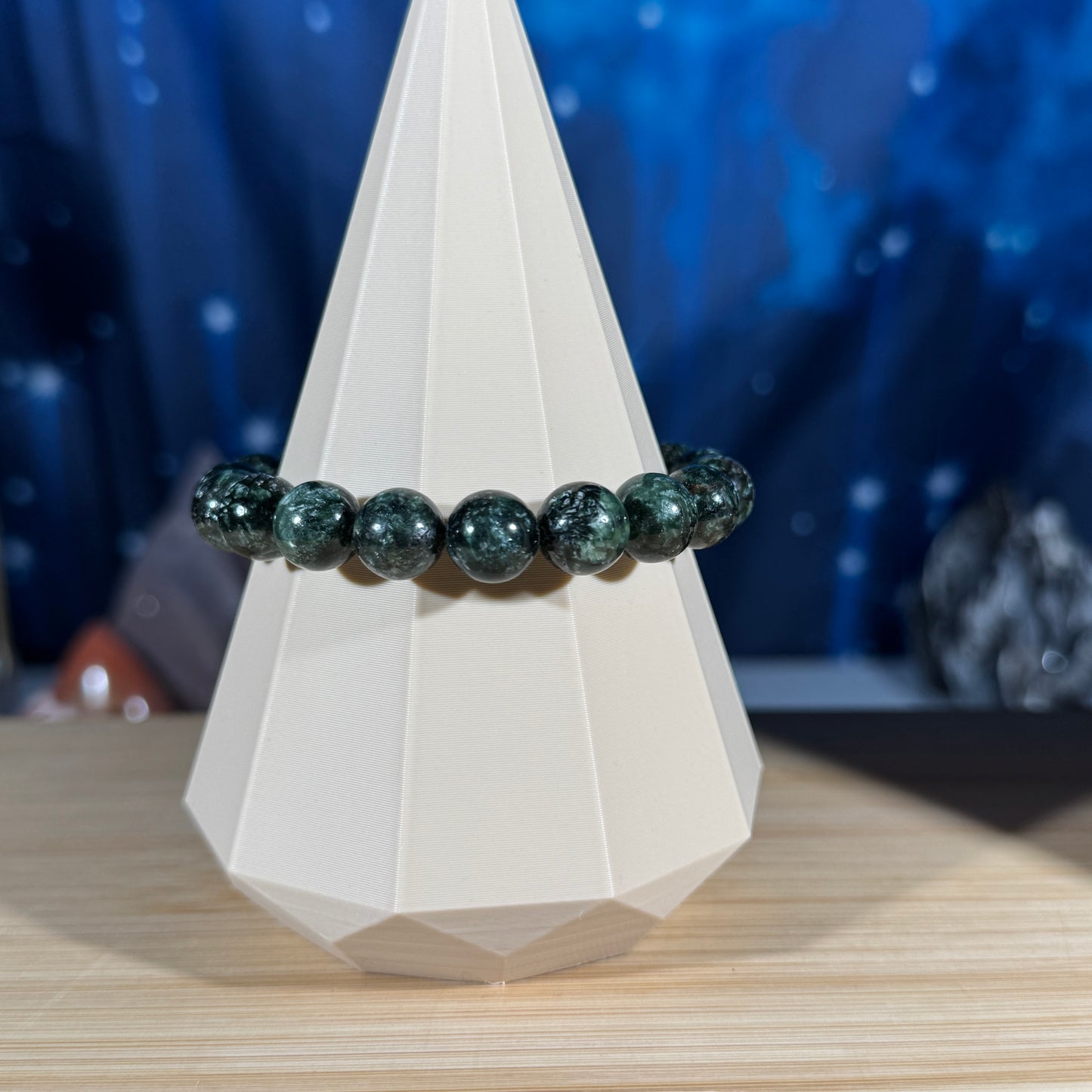 One (1) Seraphinite bracelet - 10mm beads - fits 6.5" wrist - flashy