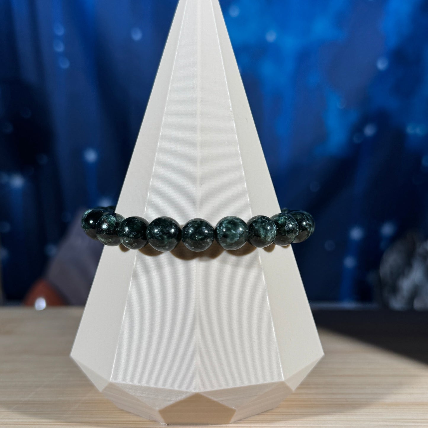 One (1) Seraphinite bracelet - 9mm beads - fits 6.75" wrist - flashy