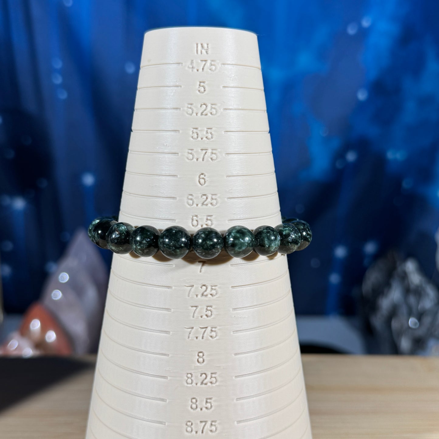 One (1) Seraphinite bracelet - 9mm beads - fits 6.75" wrist - flashy
