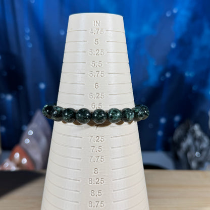 One (1) Seraphinite bracelet - 9mm beads - fits 6.75" wrist - flashy