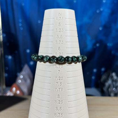 One (1) Seraphinite bracelet - 7mm beads - fits 6.5" wrist - flashy