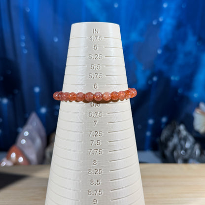 One (1) Sunstone bracelet - 6mm beads - fit 6.25" wrist - super flashy