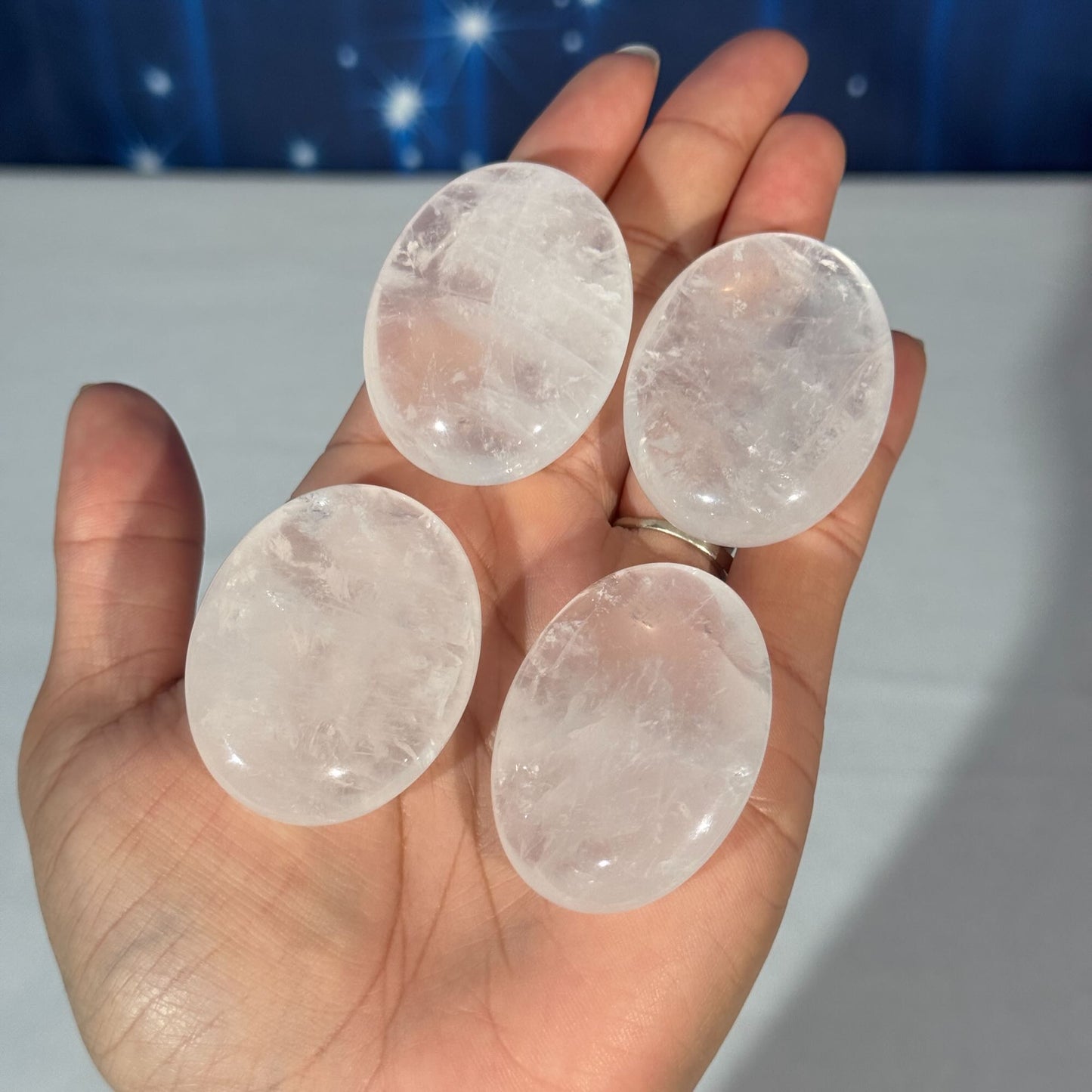 One (1) Clear Quartz Palm Stone – 0.034 kg