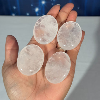 One (1) Clear Quartz Palm Stone – 0.034 kg