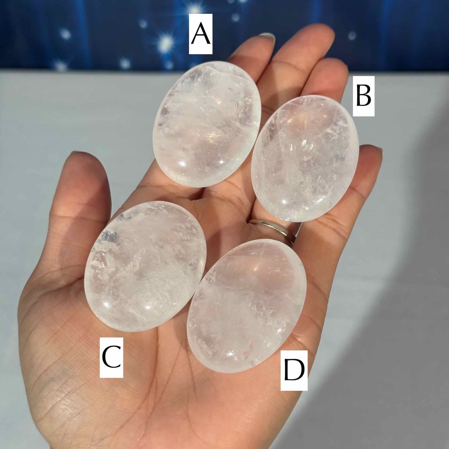 One (1) Clear Quartz Palm Stone – 0.034 kg