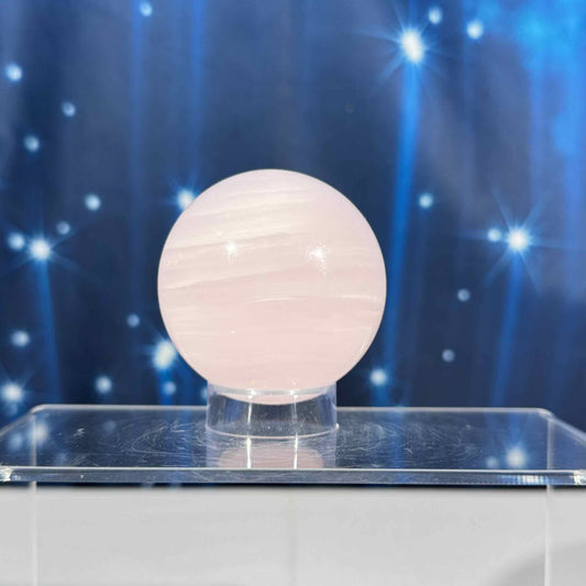 Pink Mangano Calcite sphere – UV reactive - 57 mm - 9.6 oz