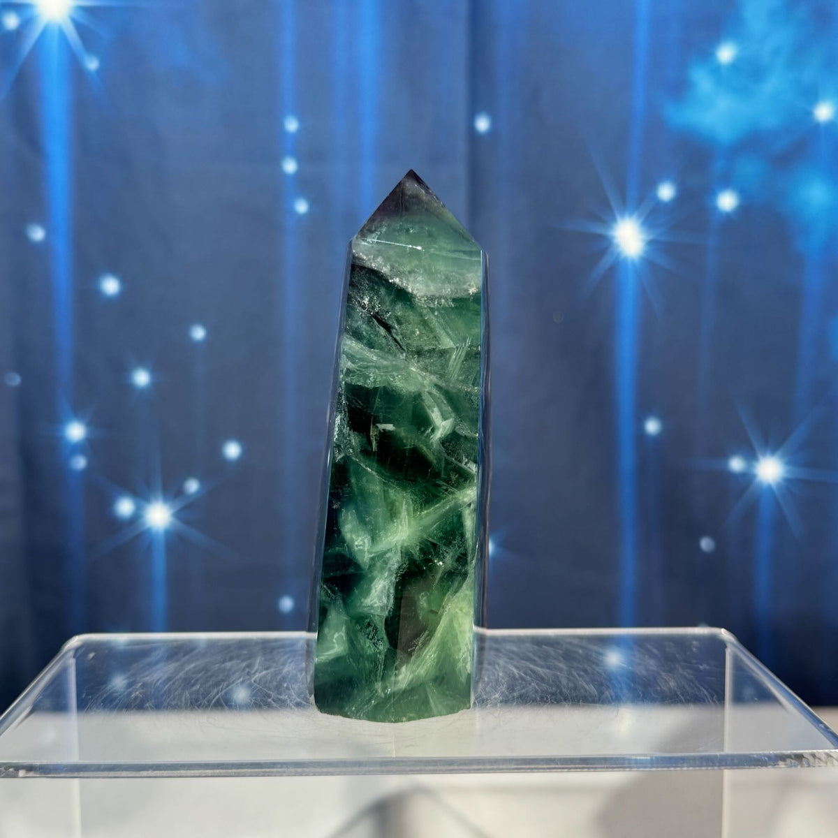 Rainbow Fluorite Point with a Natural Raw Side – 0.320 kg