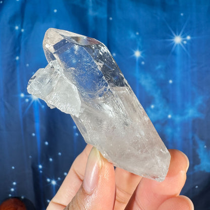 Clear quartz natural point - 2 3/4" × 1 1/2" × 1 1/4" - 2.4 oz - with rider crystal