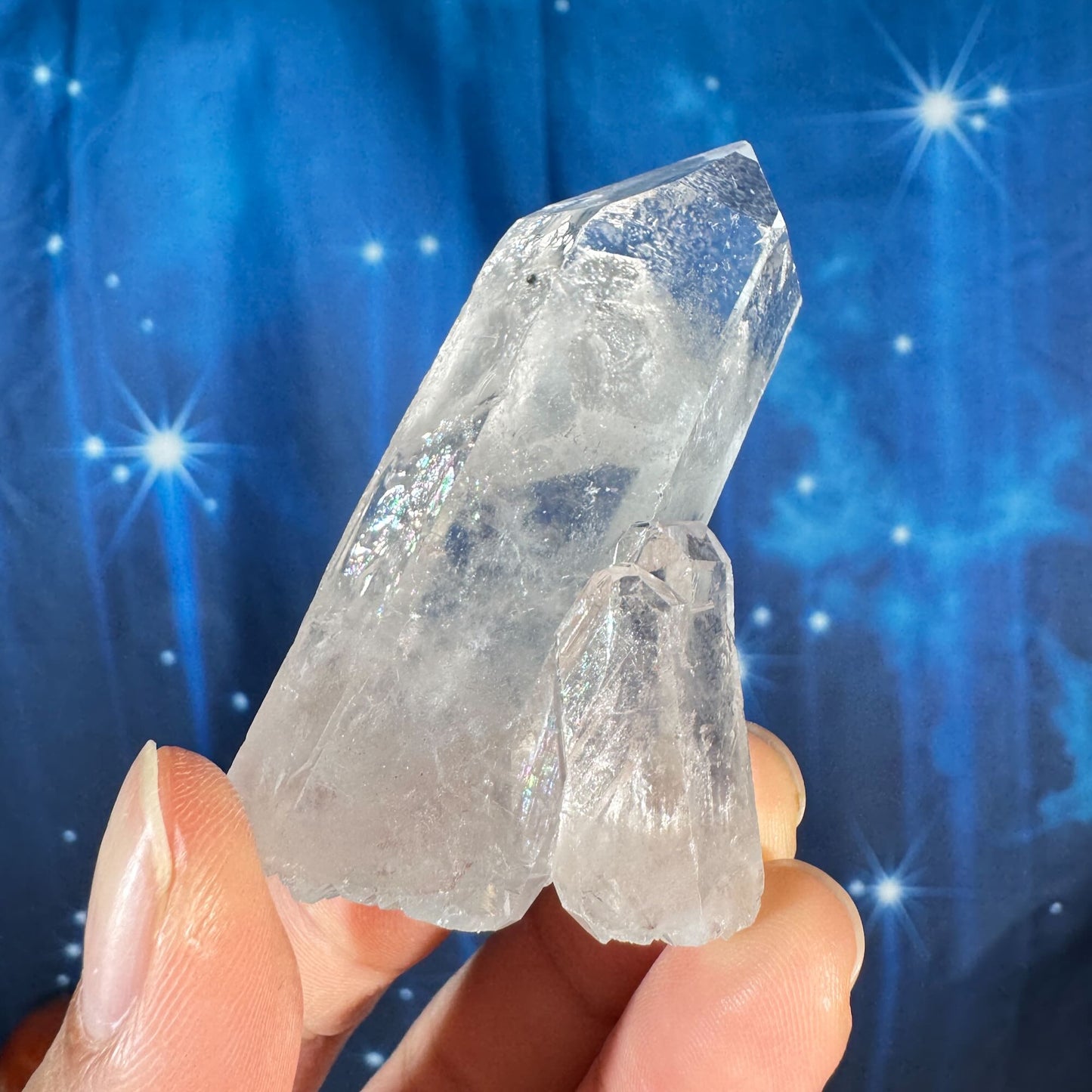 Clear quartz natural point - 2 3/4" × 1 1/2" × 1 1/4" - 2.4 oz - with rider crystal