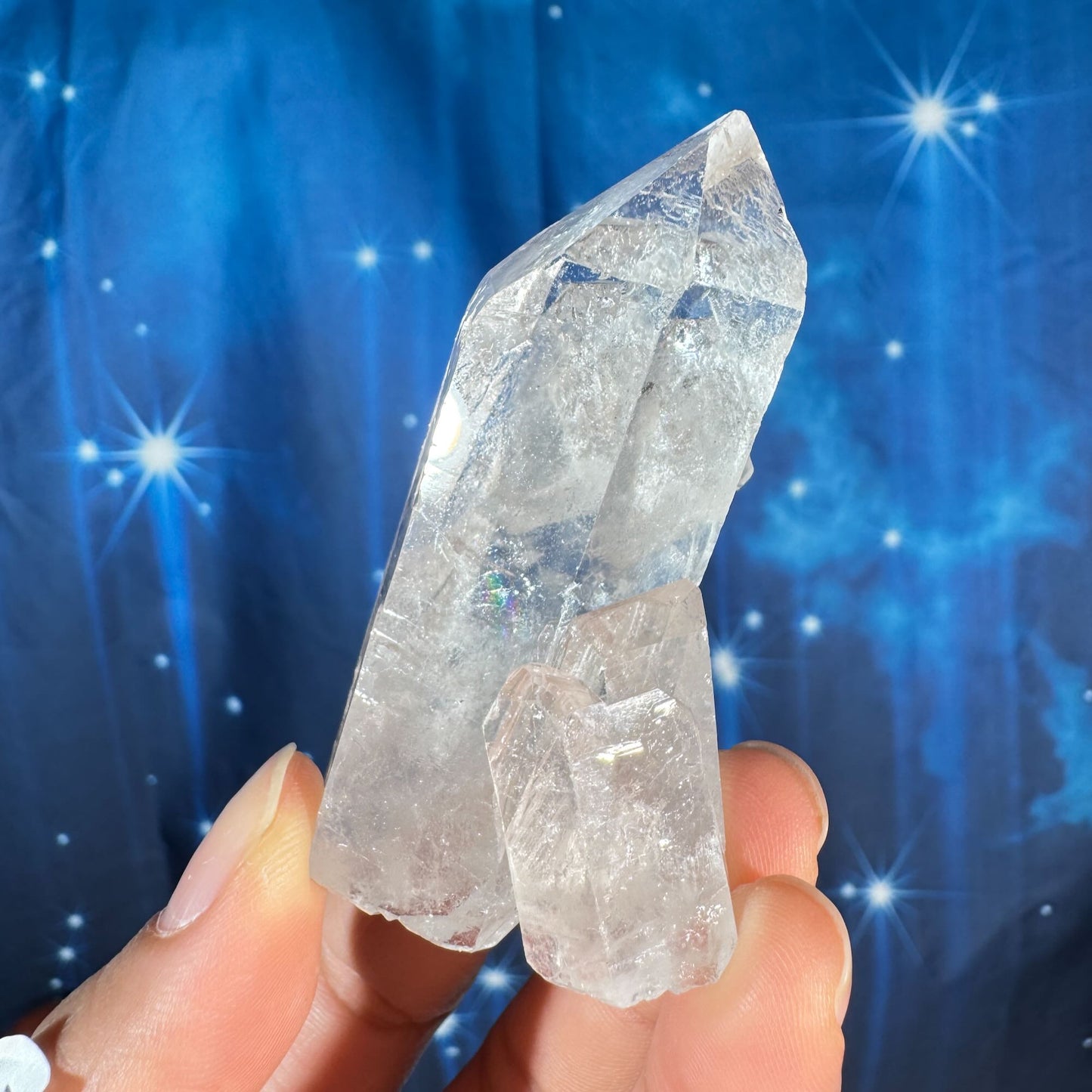 Clear quartz natural point - 2 3/4" × 1 1/2" × 1 1/4" - 2.4 oz - with rider crystal
