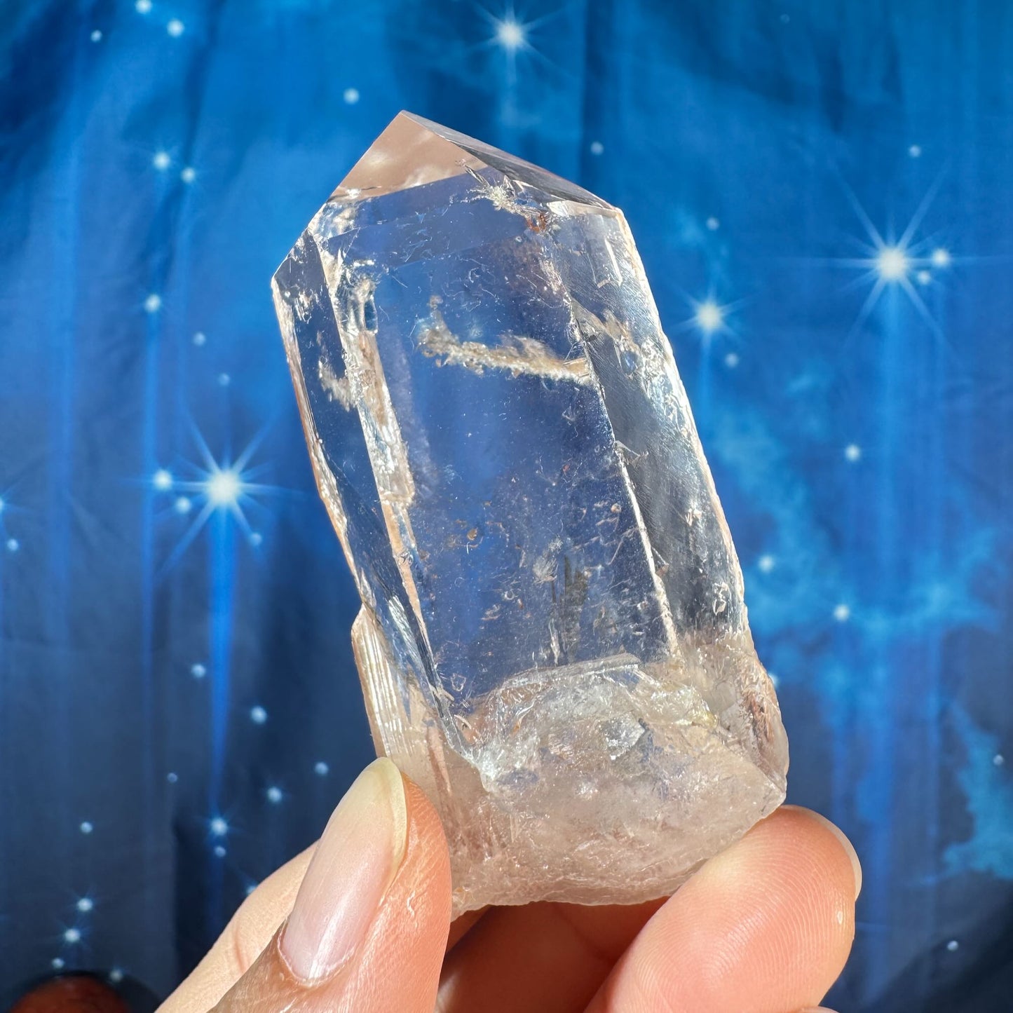 Clear quartz natural point with hematite inclusions - 1 3/8" × 1 1/8" × 3" - 3.6 oz - self-healed base