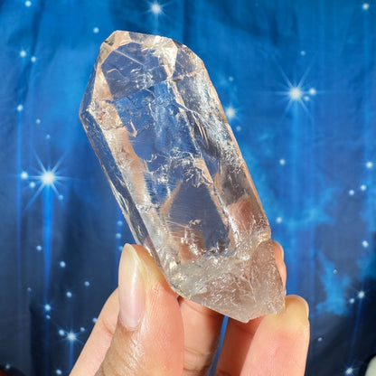 Clear quartz natural point with hematite inclusions - 1 3/8" × 1 1/8" × 3" - 3.6 oz - self-healed base