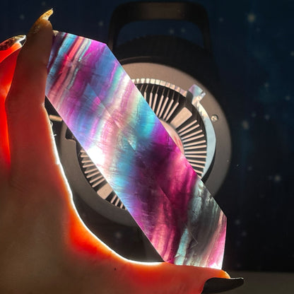 Rainbow fluorite dt with lots of colors and banding back lit