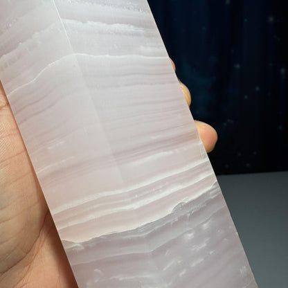 XL pink Mangano Calcite tower | 9 5/8” tall | 1.443 kilograms | Damage Discount | UV reactive | pink Banded Calcite tower