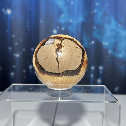 Septarian sphere | 68mm | 456 grams | Dragon Stone | UV reactive | stand included