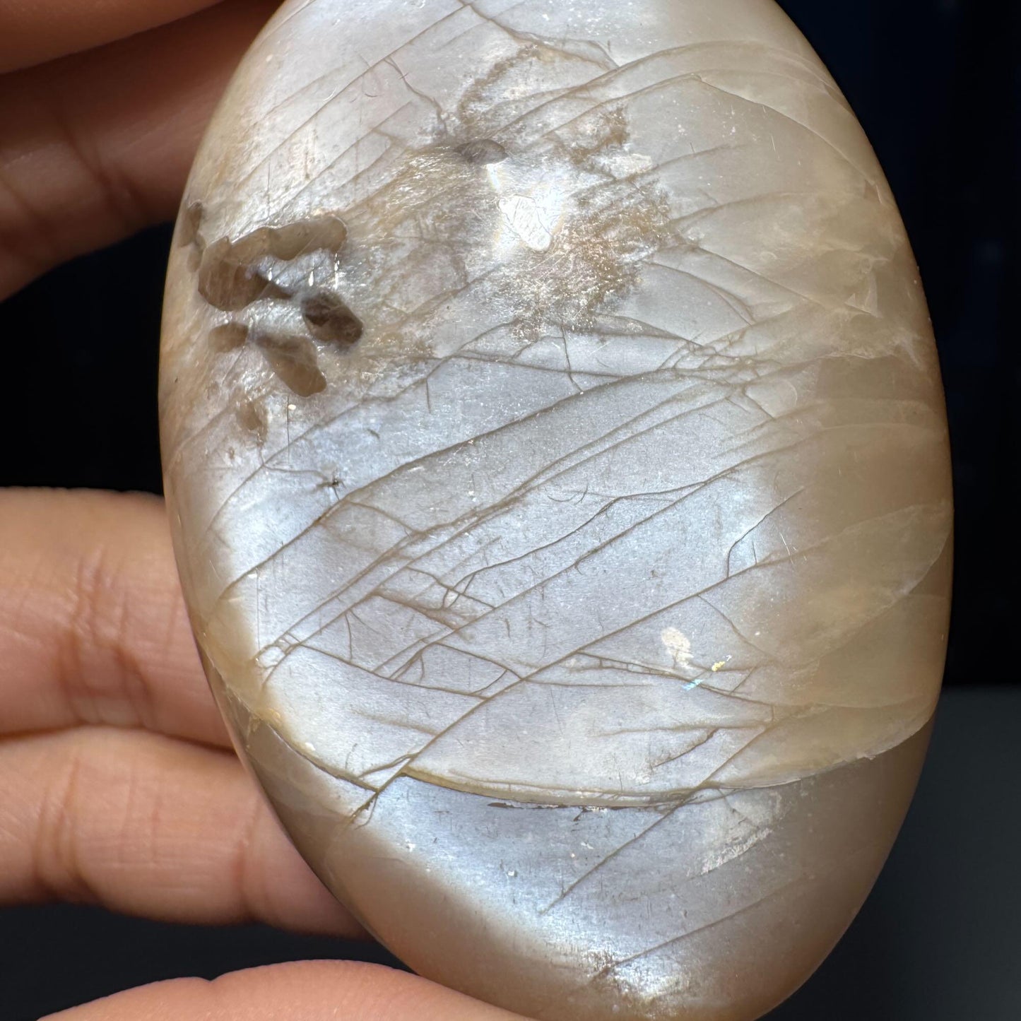 Flashy Peach Moonstone palm stone | 2 5/8" long | 113 grams | dual flash | Sunstone inclusion | Smoky Quartz inclusion