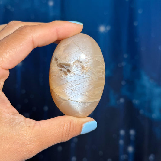 Flashy Peach Moonstone palm stone | 2 5/8" long | 113 grams | dual flash | Sunstone inclusion | Smoky Quartz inclusion