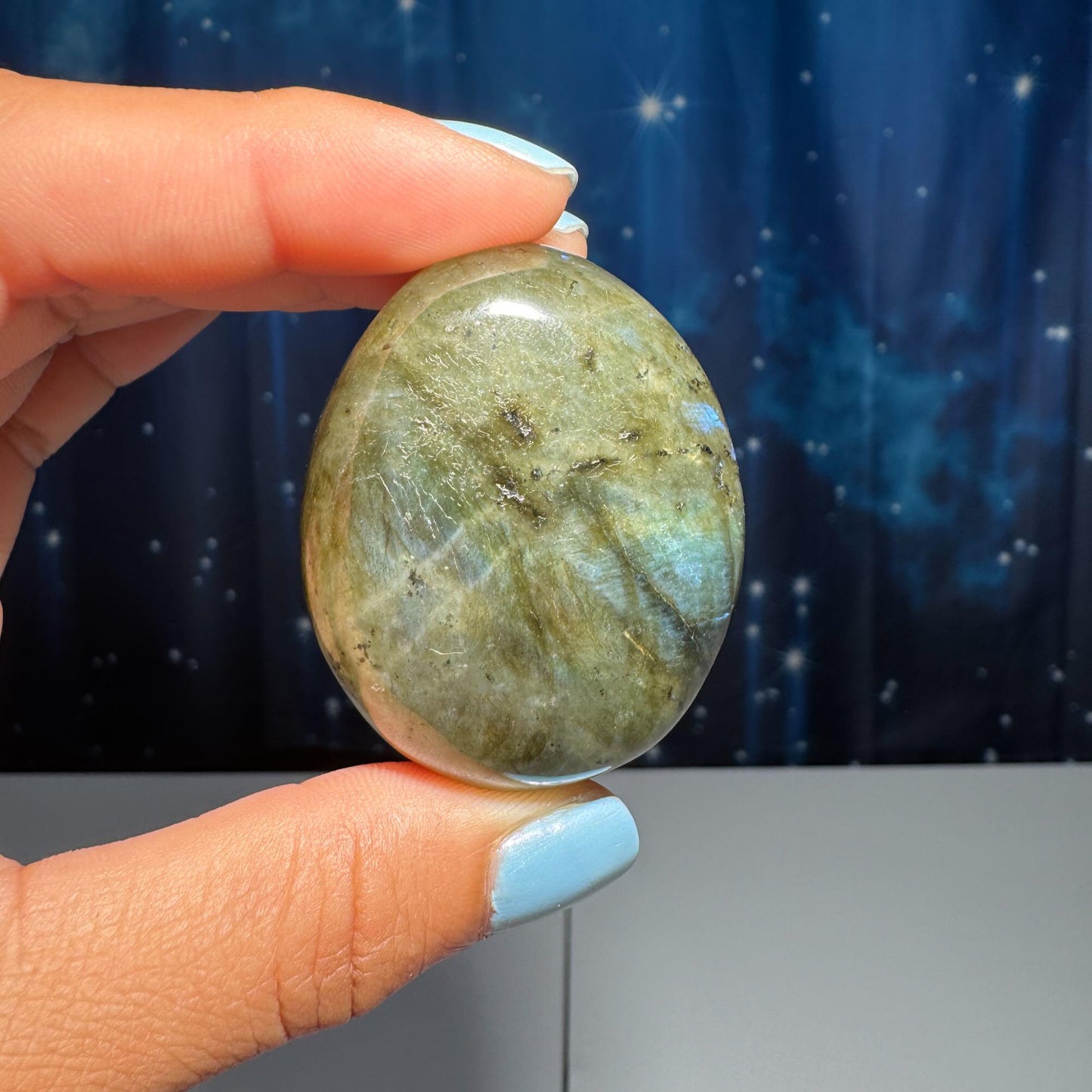 Labradorite palm stone | 1 7/8” long | 76 grams | blue flash | yellow flash | silver flash | orange flash